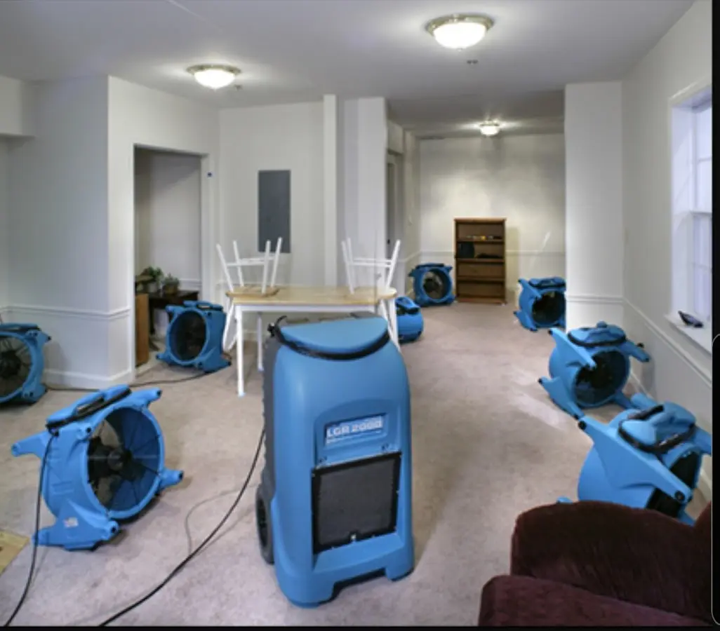 Air movers and dehumidifier setup for Water Damage Restoration in Moberly